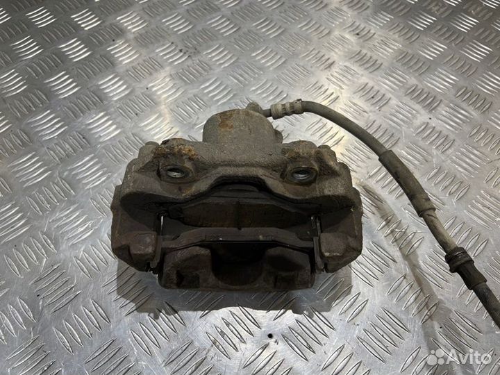 Суппорт передний правый Volkswagen Polo седан 1.6