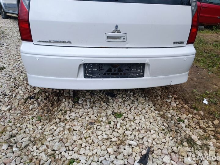 Бампер задний Мицубиси Лансер 9. Цедиа универсал