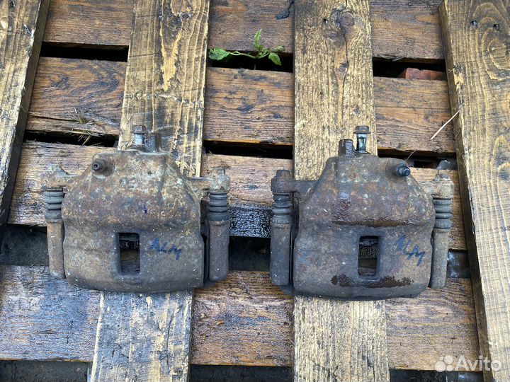 Передний супорт Nissan Almera N16