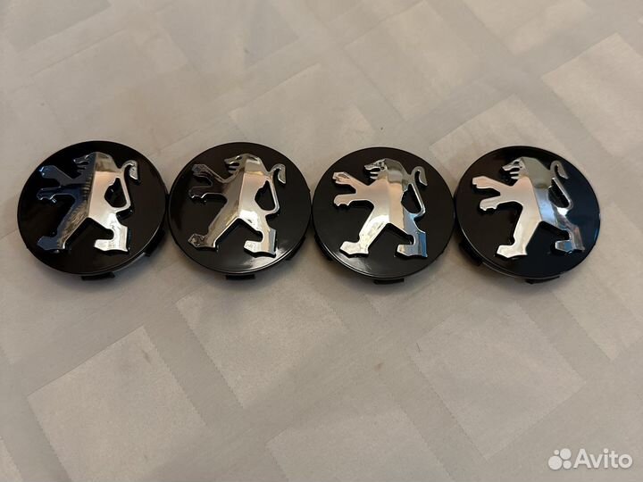 Колпачки на литые диски Peugeot