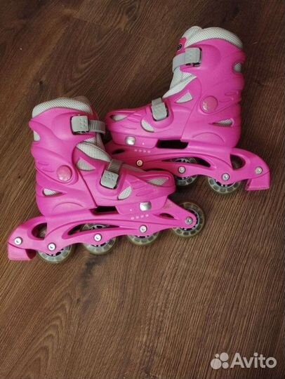Роликовые коньки