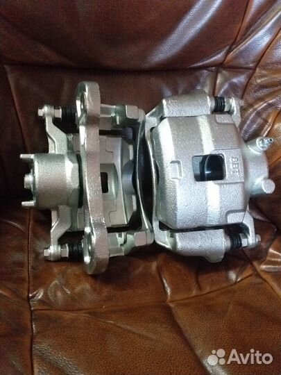 Суппорт передний Mitsubishi L200