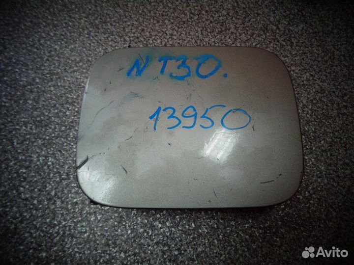 Лючок бензобака Nissan Xtrail NT30