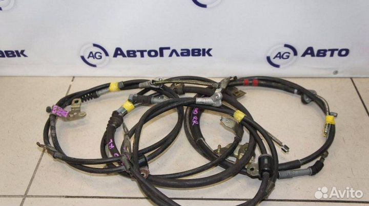 Трос стояночного тормоза Mazda 626