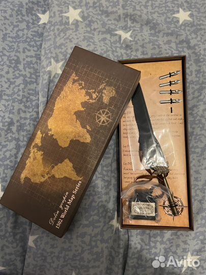 Перо с чернилами