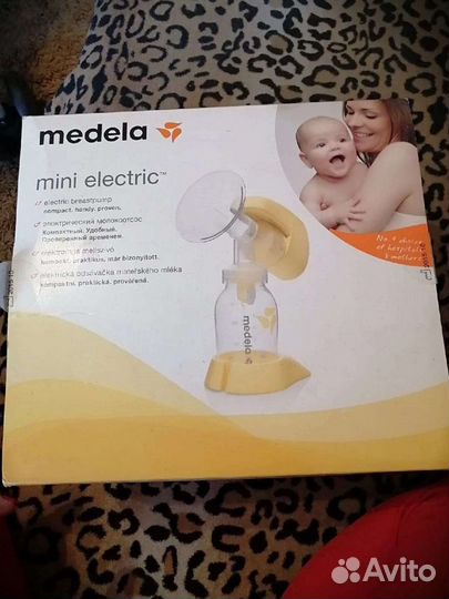 Молокоотсос medela электрический