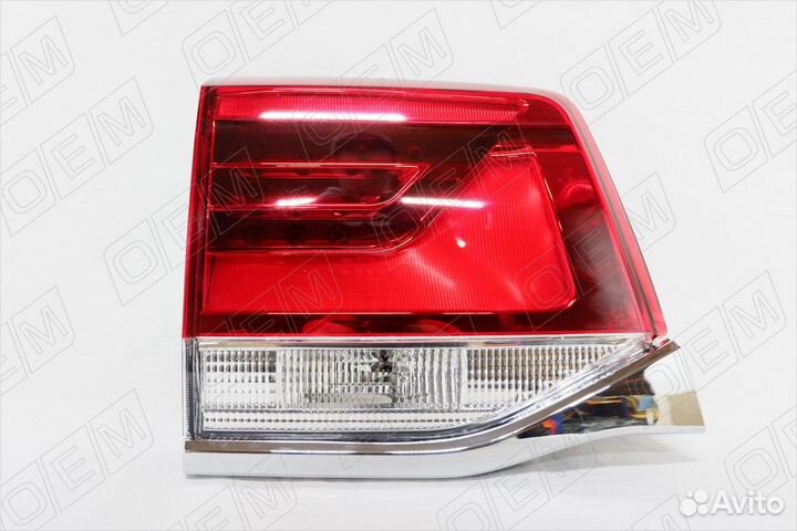 Фонарь левый задний в крышку багажника 560014