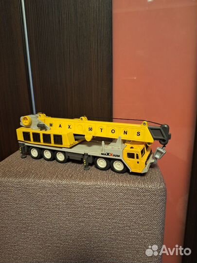 Машина кран