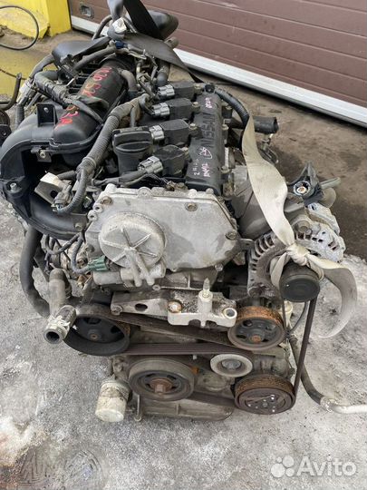 Двигатель QR20DE QR20-521553A