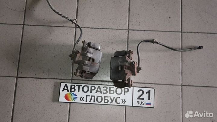 Суппорт тормозной передний Kia Cerato 3