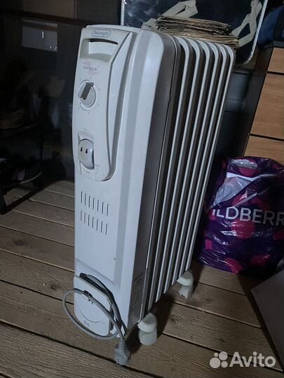 Масляный обогреватель delonghi