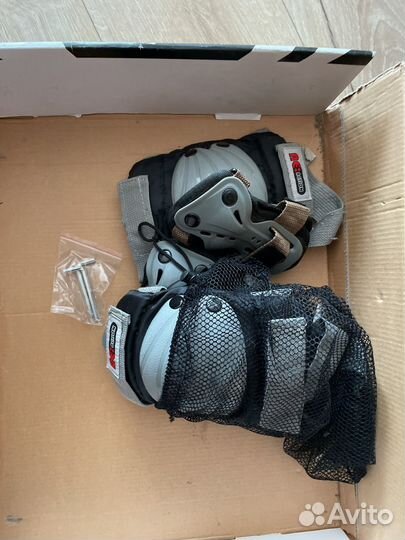 Роликовые коньки