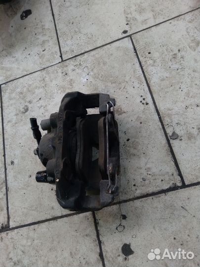 Суппорт передний opel vectra b