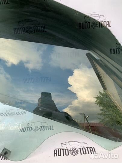 Стекло двери заднее левое Renault Logan K7J710