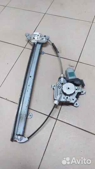 Стеклоподъемник эл.передний правый Nissan Tiida