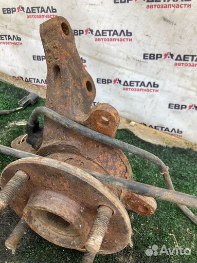 Кулак поворотный передний правый Mitsubishi Lancer