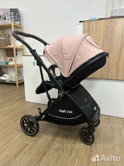 Коляска с перекидной ручкой, реверсивный блок