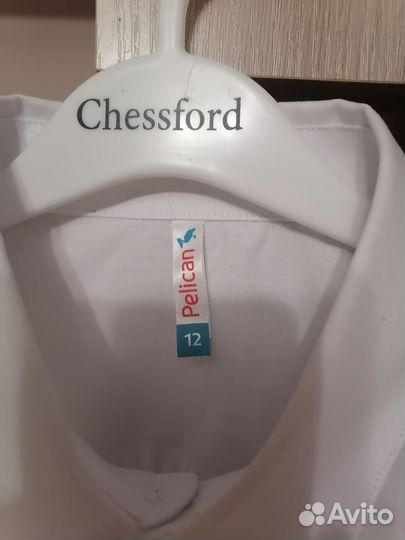 Продам белую рубашку на мальчика