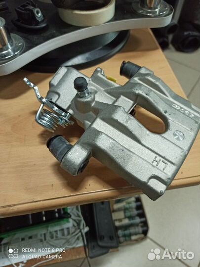 Суппорт тормозной задний левый nissan Almera4500