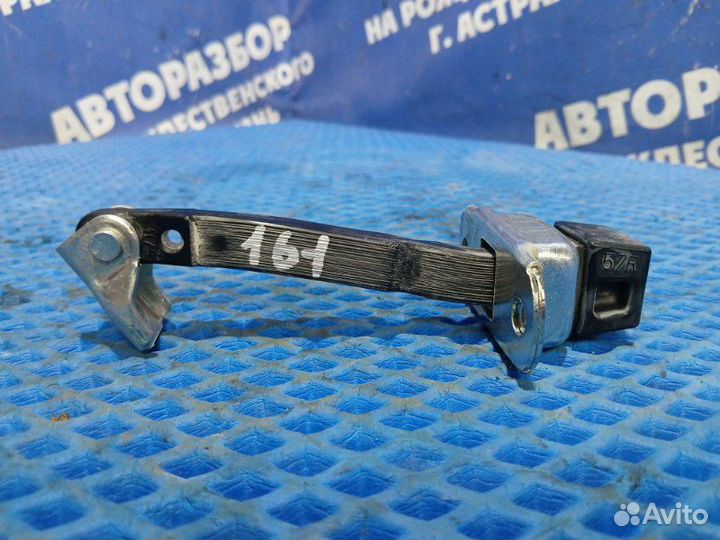 Ограничитель двери Mitsubishi L200 пикап 4D56 2010