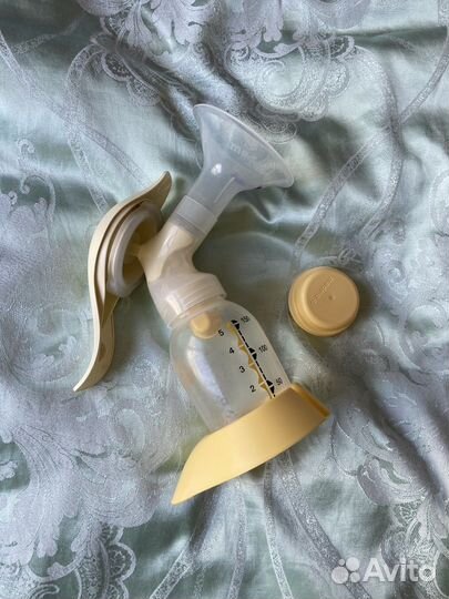 Молокоотсос medela ручной