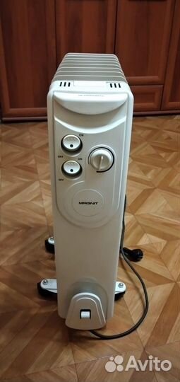 Масляный обогреватель