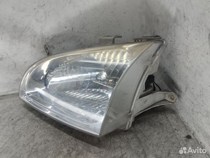 Фара левая KIA Carens 1999-2002 год, оригинал
