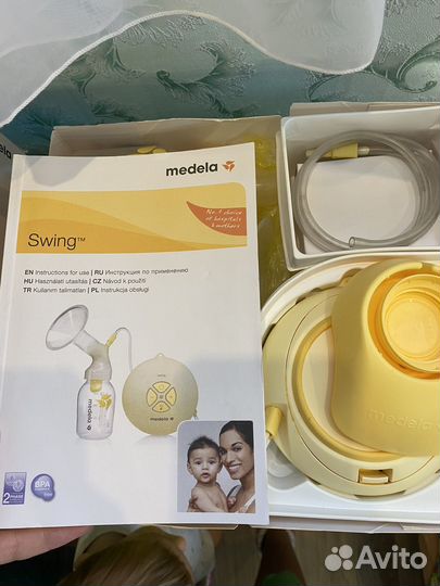 Молокоотсос medela электрический