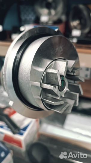 Насос водяной с прокладкой Nexia Aveo Lanos