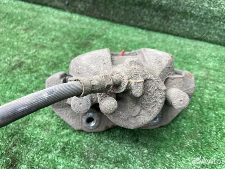 Тормозной суппорт передний левый Ford Focus 2