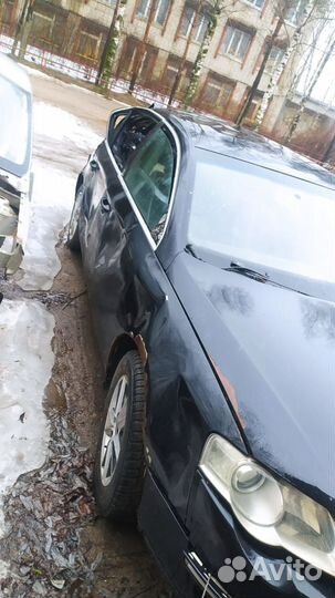 Полуось передняя левая Volkswagen Passat B6