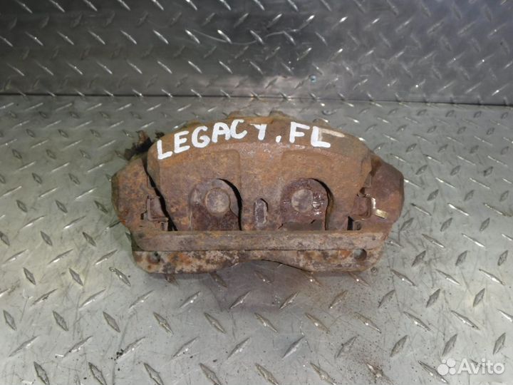 Суппорт тормозной передний левый Subaru Legacy
