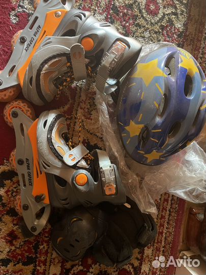 Продаю детские ролики,шлем, наколенники