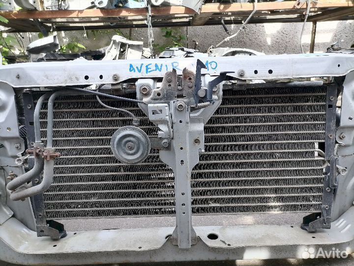 Радиатор кондиционера Nissan Avenir W10