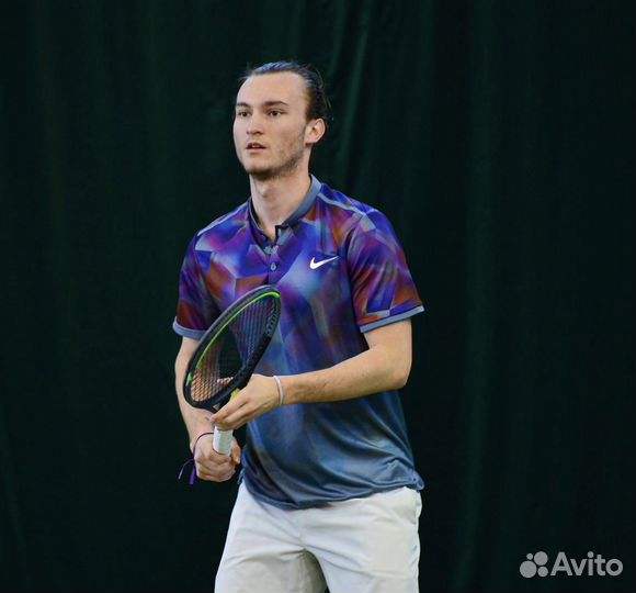 Тренер по большому теннису