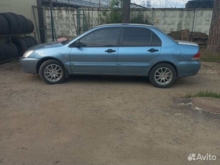Mitsubishi Lancer 1.3 МТ, 2006, 271 500 км