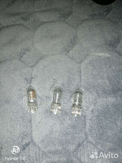 Лампа освещения номерного знака