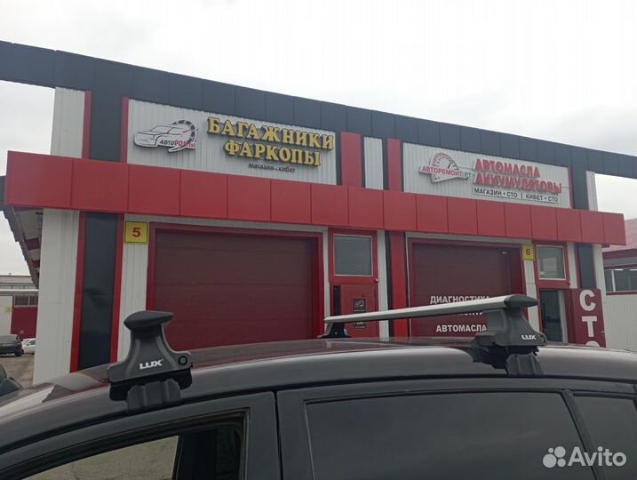 Багажник на крышу Mitsubishi L200 поперечины крыло