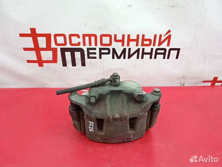 Суппорт тормозной nissan serena MR20DD