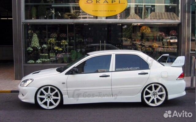 Накладки на пороги EVO на Mitsubishi Lancer 9