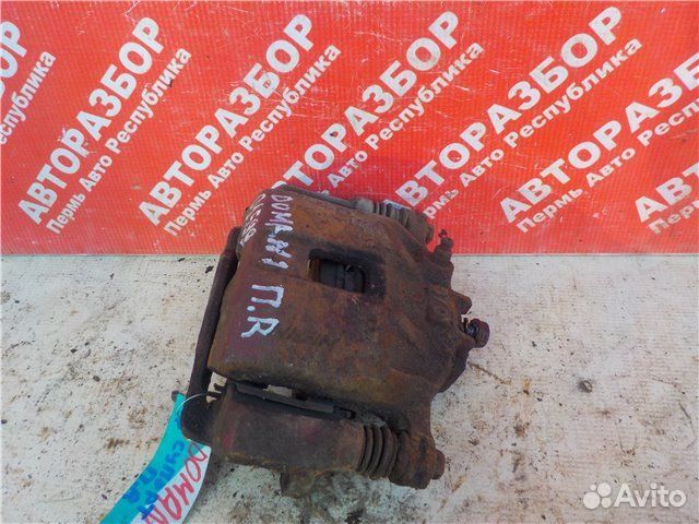 Суппорт передний правый Honda Domani 1992-1996