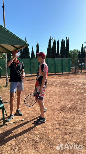 Тренер по большому теннису