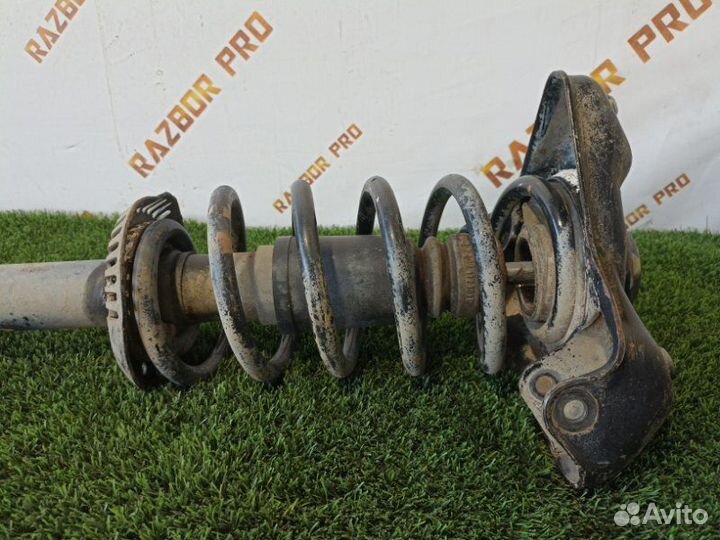 Амортизатор передний левый Volkswagen Passat B5