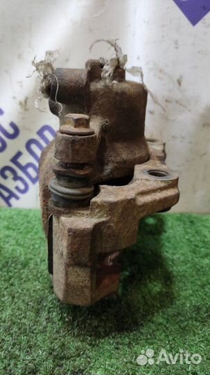 Суппорт передний левый Volkswagen Polo седан 1.6