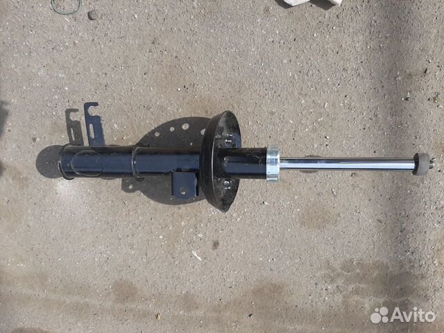 Chevrolet Cruze амортизатор передний правый GM