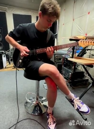 Репетитор по игре на гитаре