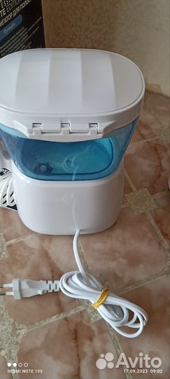 Ирригатор новый + жидкость для ирригатора