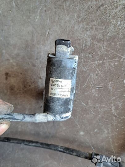 Моторчик бачка омывателя Chevrolet Lacetti