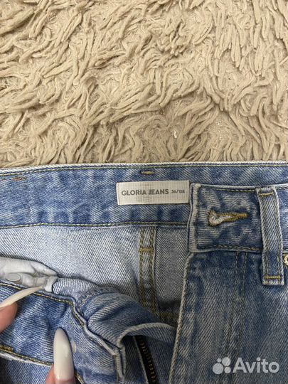 Широкие джинсы на высокой посадке