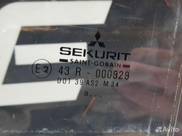 Стекло задней левой двери Mitsubishi Carisma хетчб